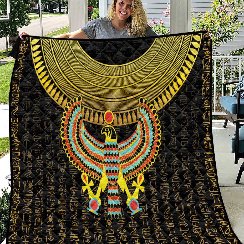 Black quilt with large gold semicircle collar and multicolor Horus falcon center emblem