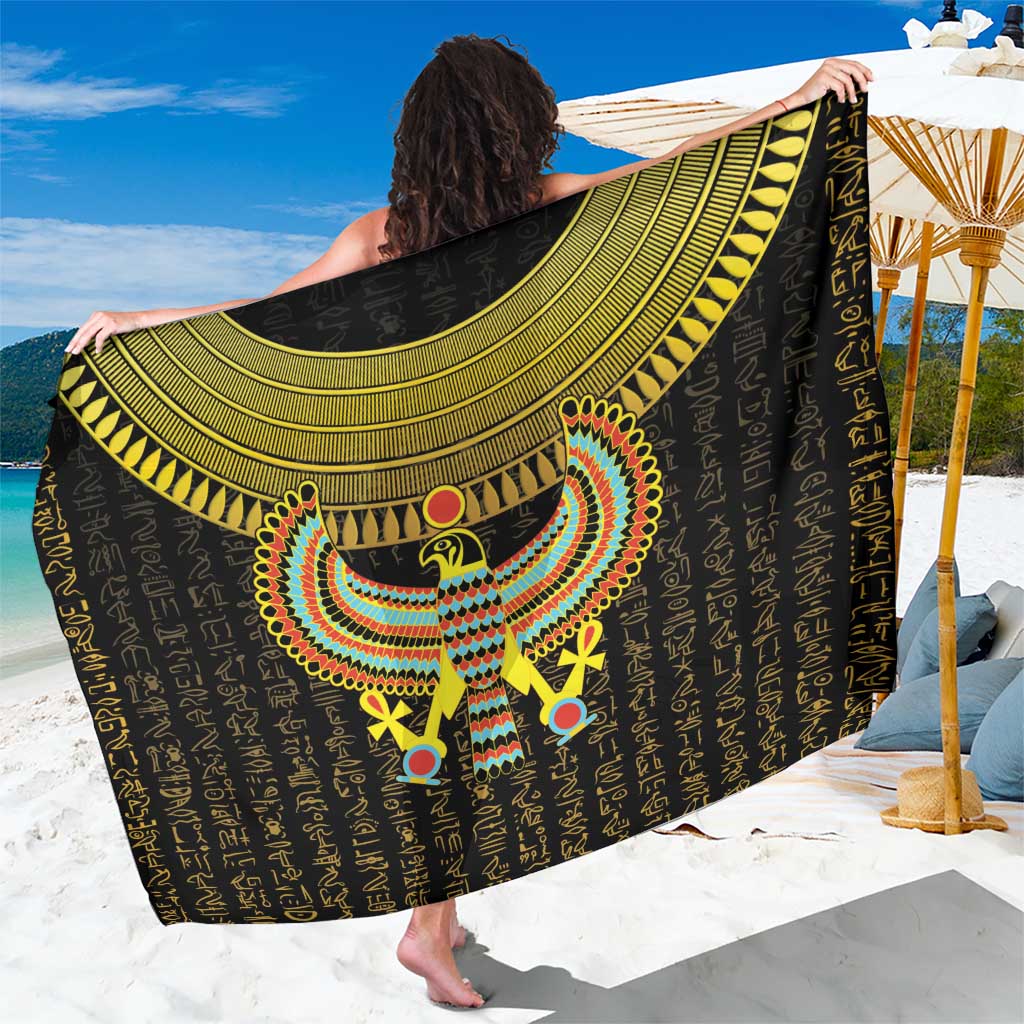 Black Egyptian sarong with gold Horus falcon emblem and patterned hieroglyph print