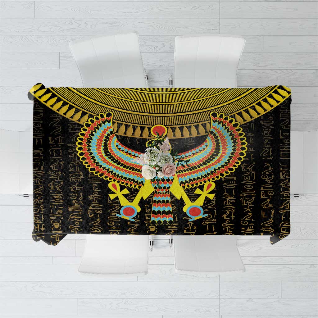 Black tablecloth with gold hieroglyphs and colorful Horus falcon emblem in center