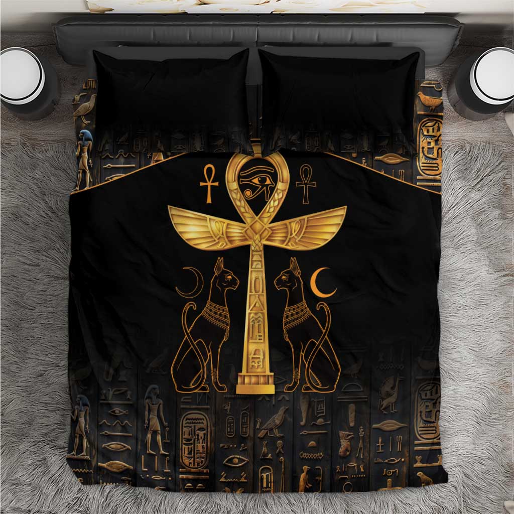 Black bedding set with gold ankh and Eye of Horus graphic on duvet and pillowcases