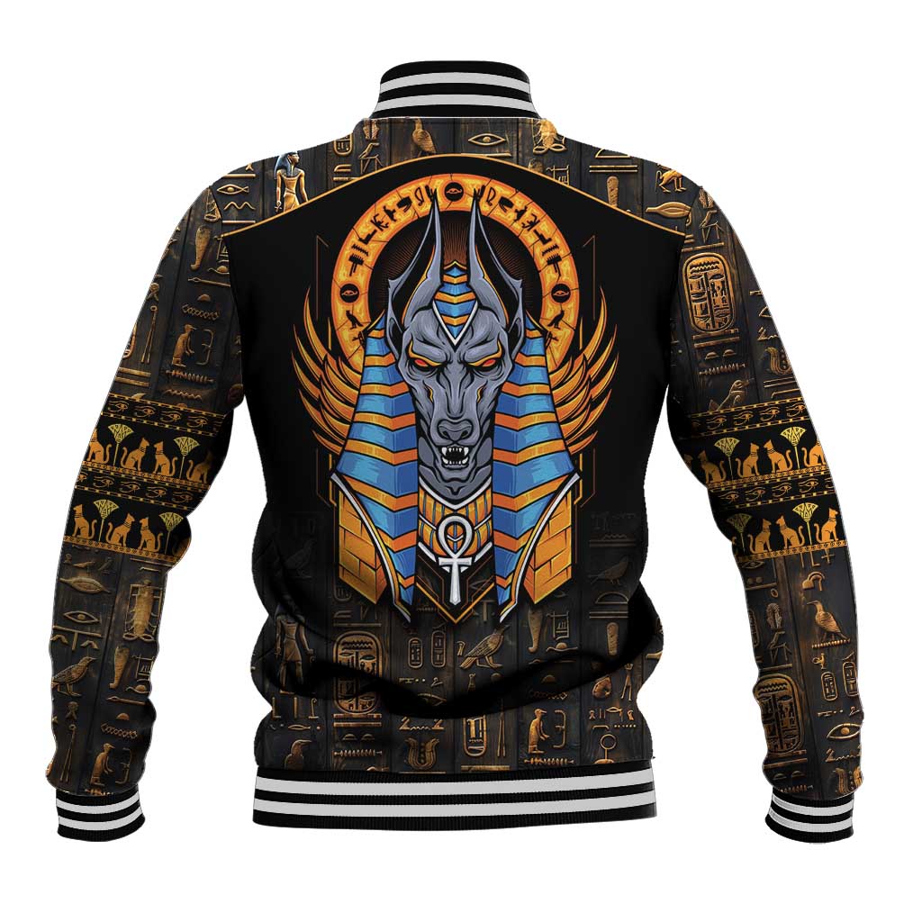 Black baseball jacket with Anubis graphic on back, striped ribbed collar and cuffs