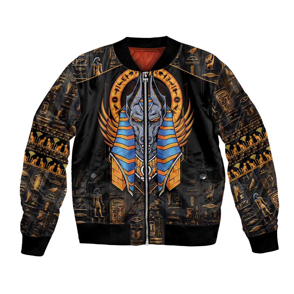 Black bomber jacket with central Anubis graphic, gold hieroglyphs, ribbed cuffs and hem