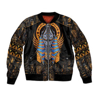 Black bomber jacket with central Anubis graphic, gold hieroglyphs, ribbed cuffs and hem