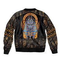 Black bomber jacket with large Anubis emblem, gold hieroglyph print, ribbed trim