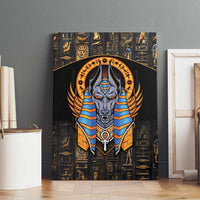 Black canvas wall art featuring Anubis with blue-and-gold winged headdress