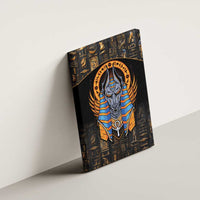 Black canvas wall art of Anubis with blue-and-gold winged headdress, side view
