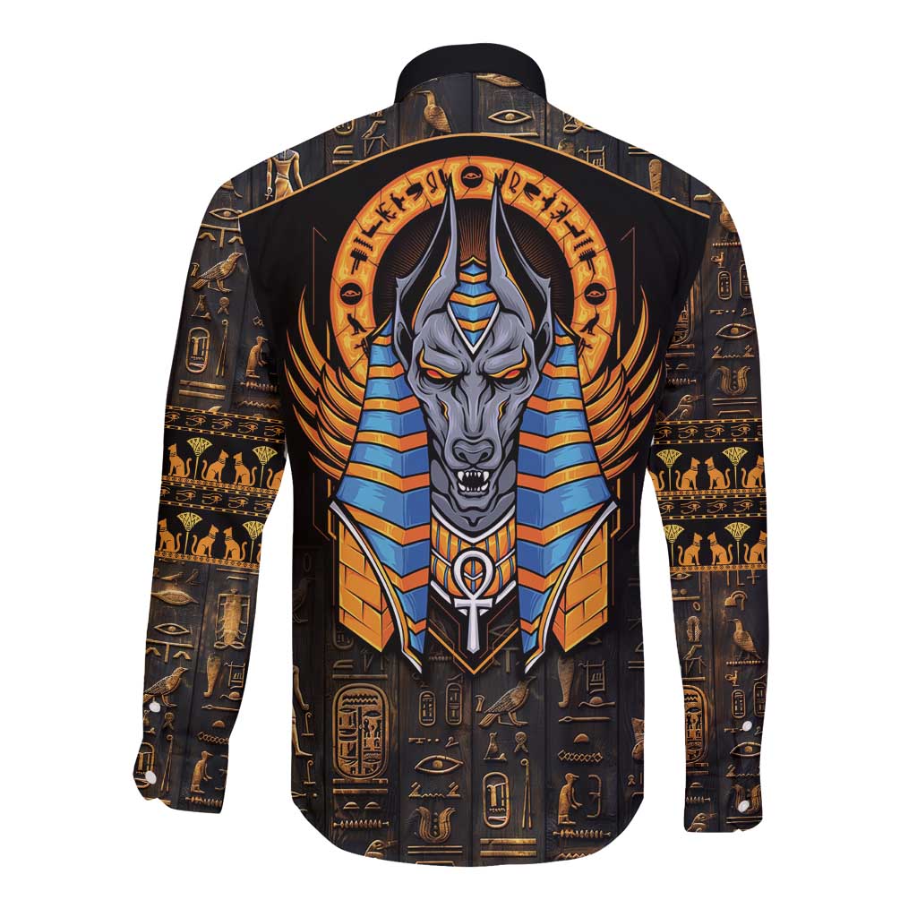 Black long-sleeve button shirt with Anubis face centered on back and Egyptian icon pattern