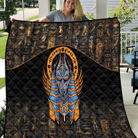 Black Egyptian Anubis quilt with gold hieroglyph pattern and central Anubis portrait