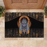 Black Egyptian Anubis rubber doormat with gold and blue winged Anubis emblem