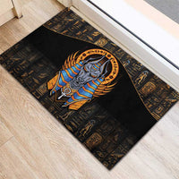 Black Egyptian Anubis rubber doormat featuring gold winged Anubis in blue headdress