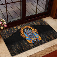 Black Egyptian Anubis rubber doormat with gold and blue Anubis figure and patterned border