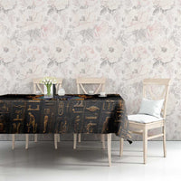 Black Egyptian hieroglyph tablecloth with blue border and Anubis-style symbols