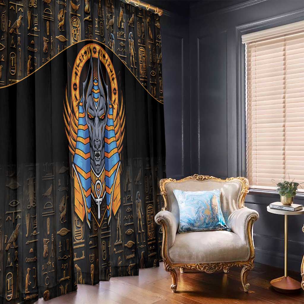 Black curtain panels featuring a large Anubis face with blue-gold collar graphic