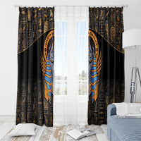 Black window curtain panels with gold hieroglyphs and centered Anubis emblem