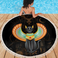 Black circular beach blanket with winged Egypt cat graphic, fringed white edge