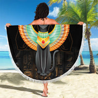 Black circular beach blanket with winged Egypt cat design, fringed white border held up