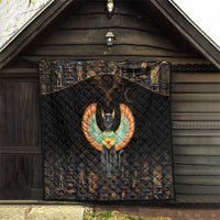 Black wall-hanging quilt with Egyptian cat wings emblem and gold patterned borders