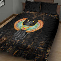 Black quilt bed set with winged cat graphic and Egyptian hieroglyph pattern, close view