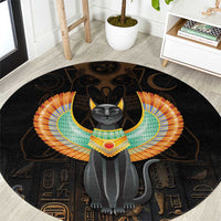 Black round area rug with winged Egypt cat, ornate headdress and hieroglyph details
