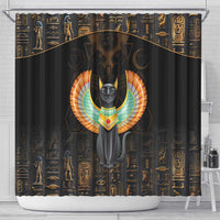 Black shower curtain featuring winged Egyptian cat center graphic with gold hieroglyph border