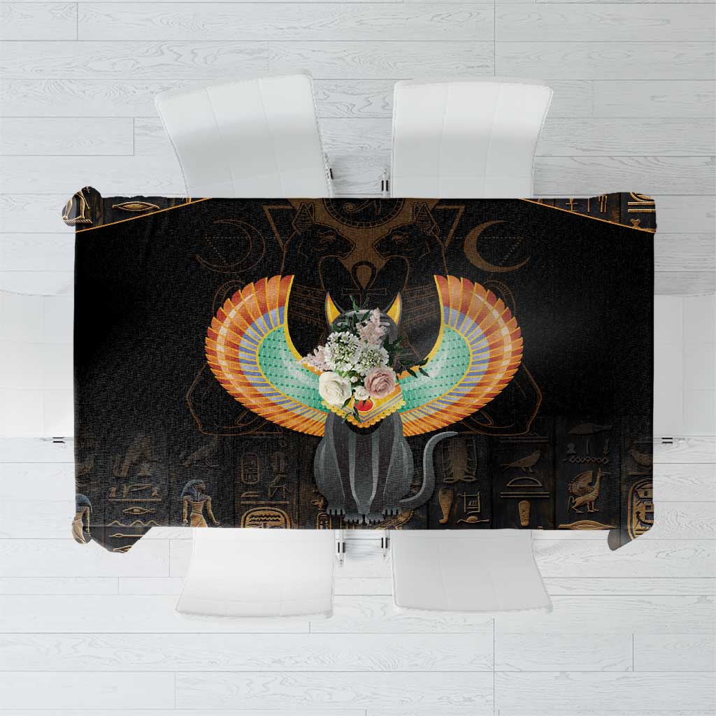 Black tablecloth with winged cat emblem and gold Egyptian hieroglyph patterns