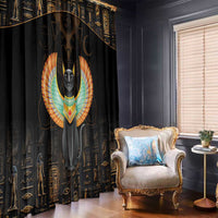 Black curtain with winged cat and Egyptian symbol print; gold lines across panels