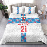 White duvet cover bedding set with two matching pillowcases; blue Luxembourg center stripe