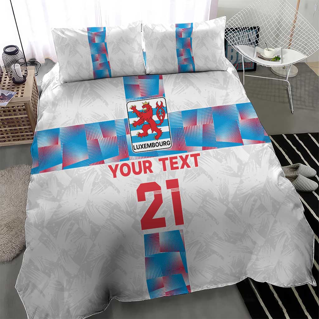 White custom bedding set featuring Luxembourg crest and blue geometric stripe with “YOUR TEXT”