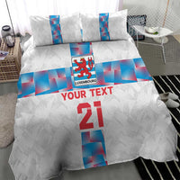 White custom bedding set featuring Luxembourg crest and blue geometric stripe with “YOUR TEXT”