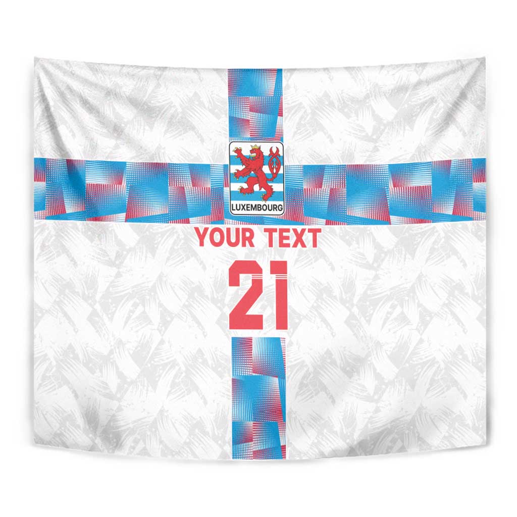 White close-up football tapestry with Luxembourg crest and blue cross beside red “21”.