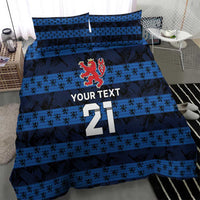 Blue football bedding set showing duvet and pillows with striped design, crest, and number 21