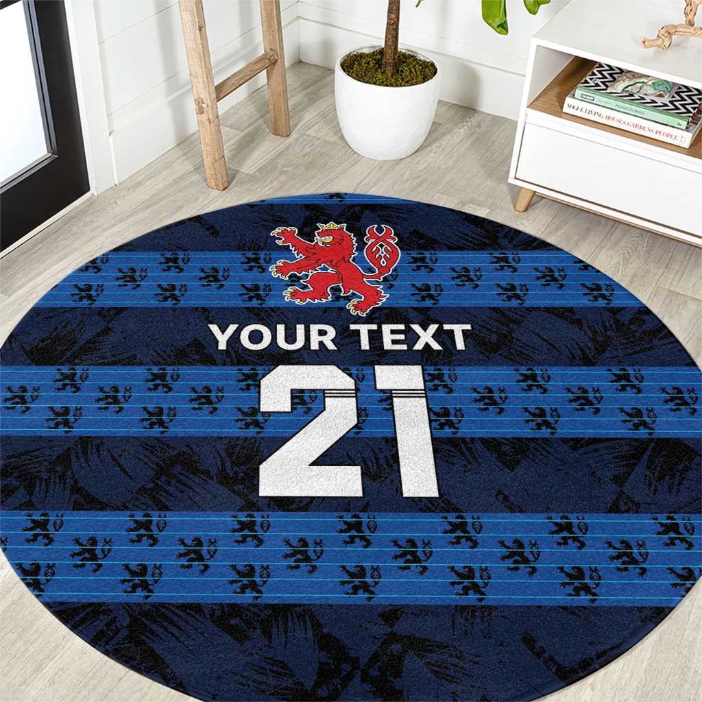 Blue round football carpet with lion crest, tribal pattern, and 21 print