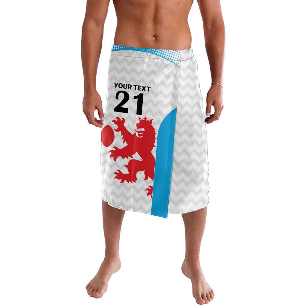 White rugby-themed lavalava skirt with red lion crest, 'YOUR TEXT 21', blue trim