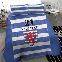 Blue and white striped bedding set featuring crest, number 21, and “YOUR TEXT” text