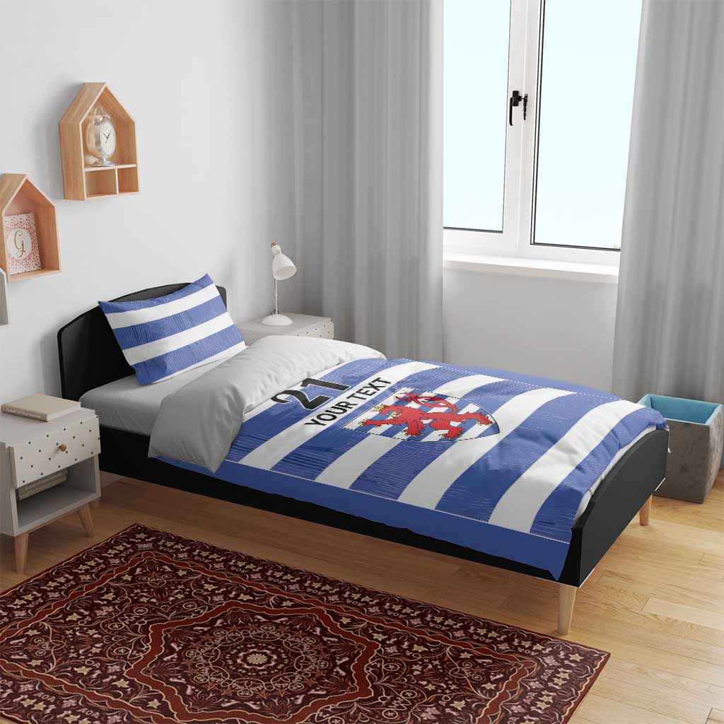 Blue and white striped comforter set with crest, number 21, and “YOUR TEXT”