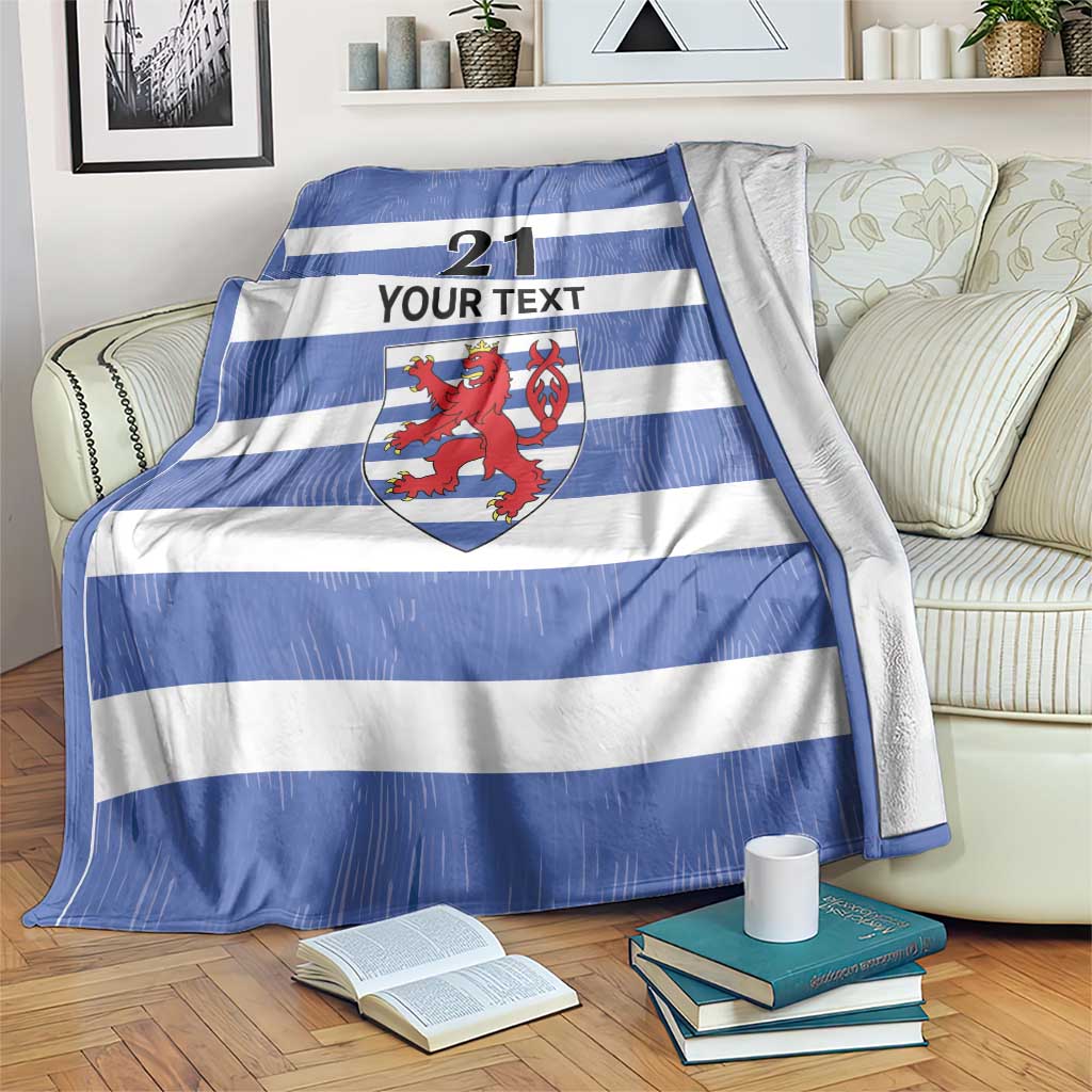 Blue/white striped blanket with crest, number 21, and 'YOUR TEXT' in center.