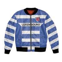 Blue bomber jacket with white stripes, front zipper, crest and Luxembourg motif