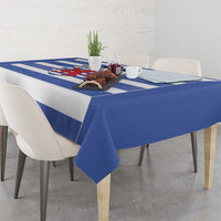 Blue tablecloth with horizontal rugby stripes and crest panel on the table surface