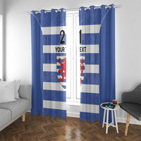 Blue and white striped window curtains with red crest and custom text, hung with decorative ties.