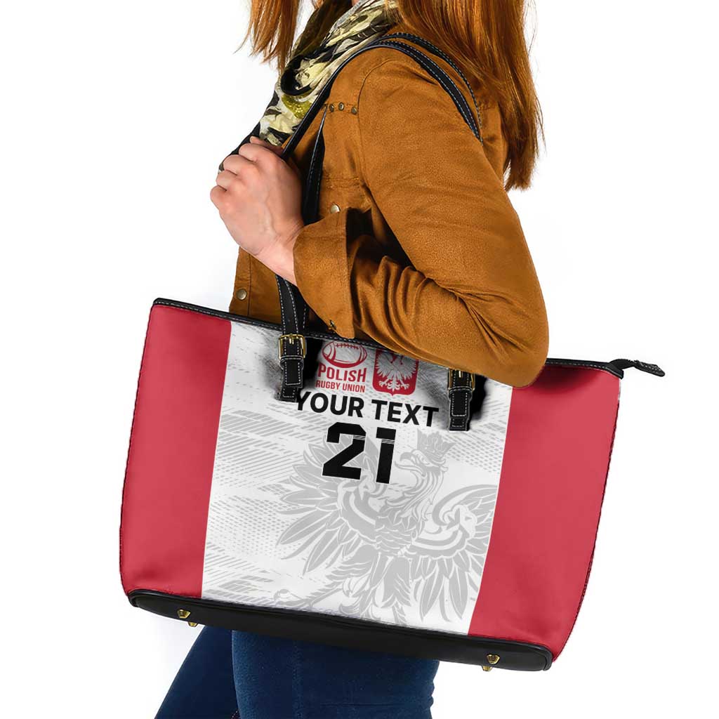 Red, white and black leather tote bag with front logo patch and top zipper