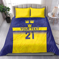 Blue and yellow duvet cover bedding set with crown icons, “YOUR TEXT,” and “21” print