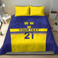 Blue and yellow duvet bedding set with crown icons above “YOUR TEXT” and “21” number