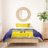 Blue and yellow duvet bedding set with crown icons, “YOUR TEXT,” and “21” across center