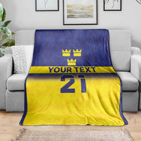 Blue and yellow custom rugby blanket with crowns crest, “YOUR TEXT,” and number 21.