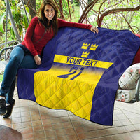 Blue and yellow Sweden-themed quilt being held outdoors, crowns, 'YOUR TEXT' and 21