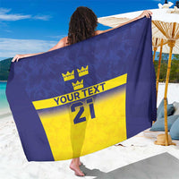 Blue and yellow custom sarong with crown graphics and large number 21, personalized text.