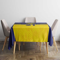 Rectangular tablecloth with blue border and yellow center featuring crown and stripe graphic