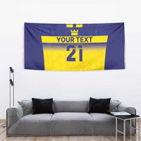 Blue banner-style wall tapestry with yellow center, three crowns, “YOUR TEXT,” 21