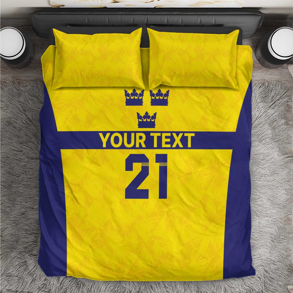 Gold and blue bedding set with 2 pillowcases; crowns and 'YOUR TEXT' over '21'.