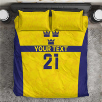 Gold and blue bedding set with 2 pillowcases; crowns and 'YOUR TEXT' over '21'.